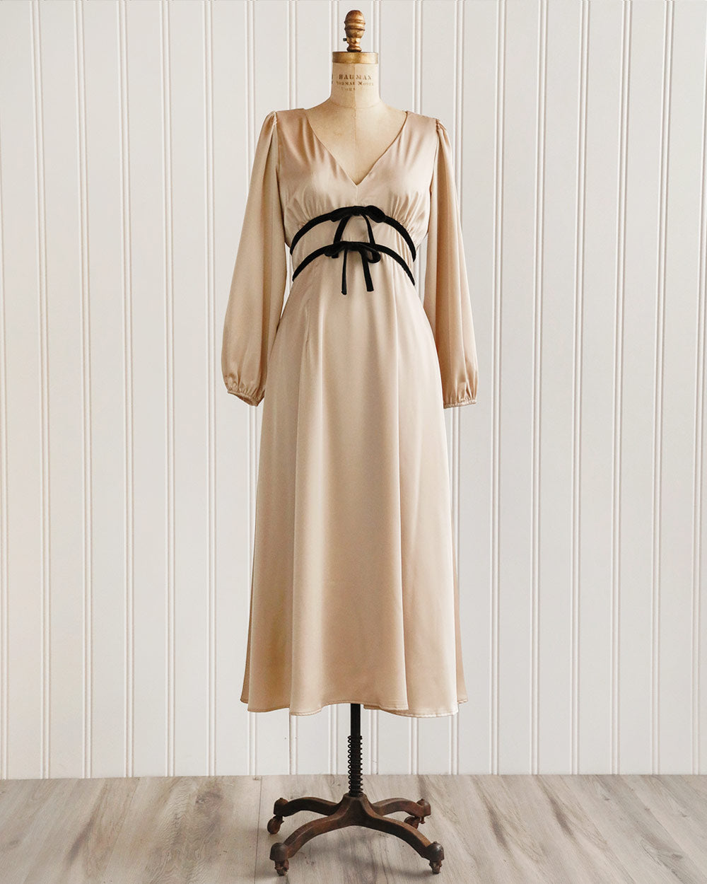 cream dress with black bows Tate Dress – HEMLINE French Quarter main image 1
